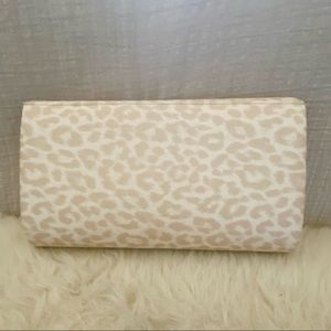 Small gold and white clutch